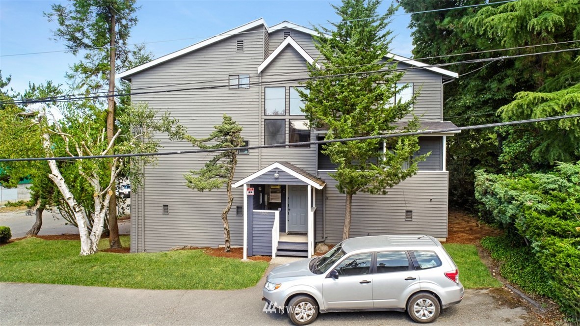 a car parked in front of a house