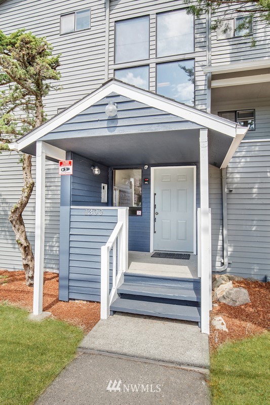 1300 North 107th Street Seattle, WA 98133 - Photo 5 of 20 a view of house with a outdoor space