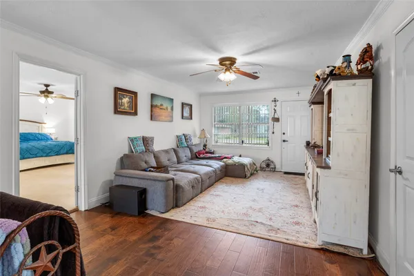 a living room with furniture and a window