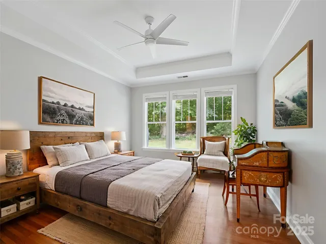 a view of livingroom with furniture and hardwood floor