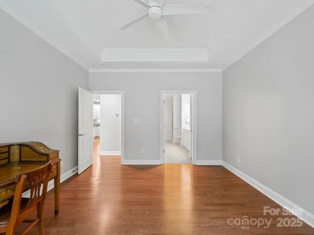 a spacious bathroom with a double vanity sink mirror and a shower
