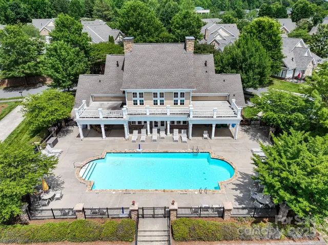 a view of a building with a yard
