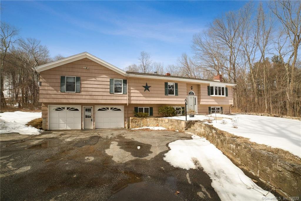 65 Connelly Road New Milford, CT 06776 - Photo 1 of 1 a view of a house with snow on the background