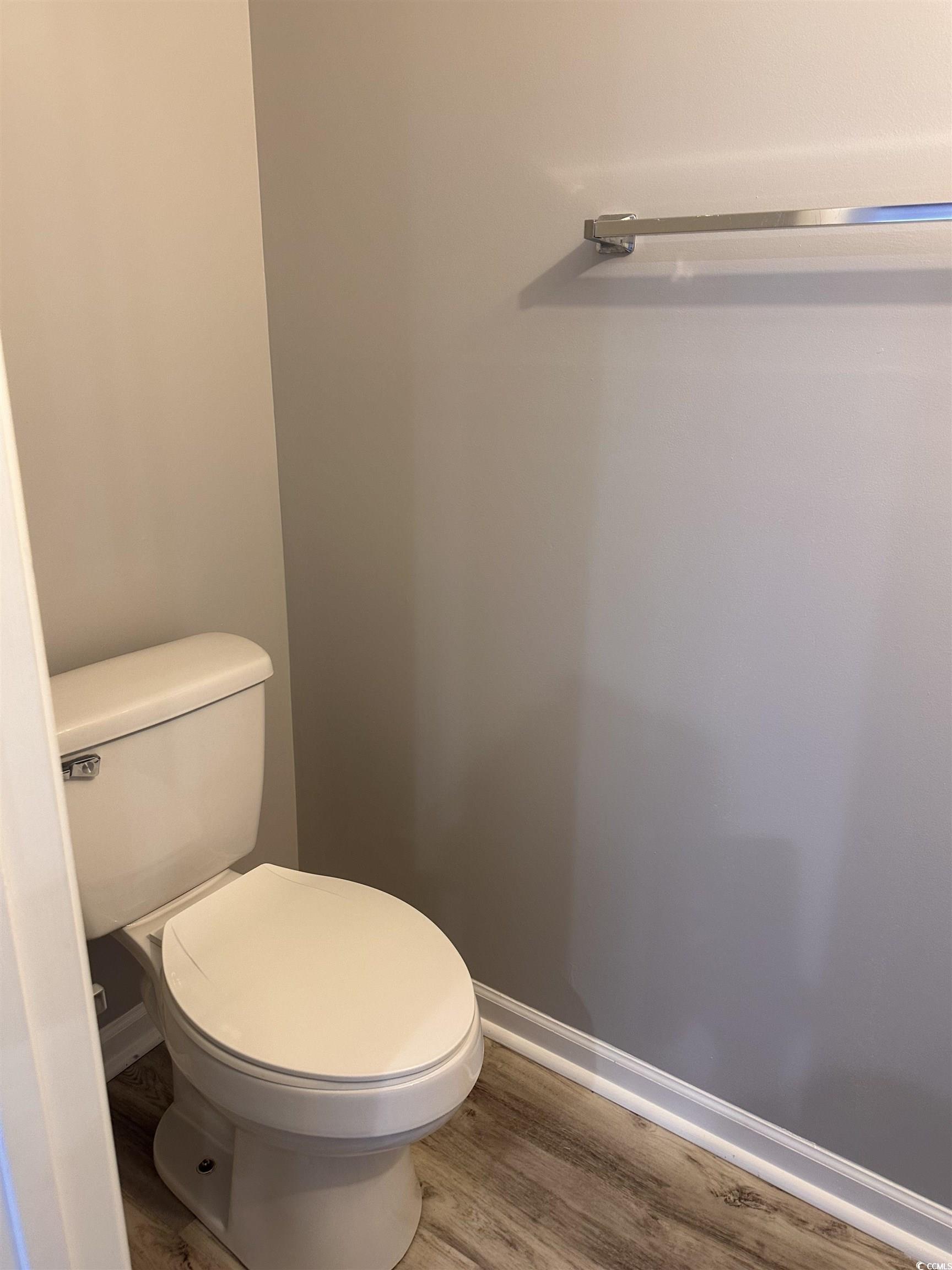 257 Seabert Road Myrtle Beach, SC 29579 - Photo 5 of 16 Bathroom with wood finished floors and baseboards