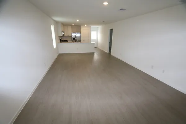 a view of a kitchen and a window