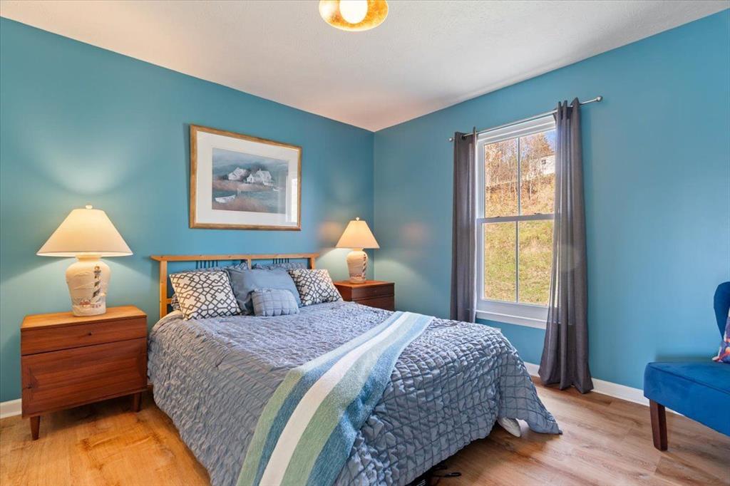 216 Lori Road Gibsonia, PA 15044 - Photo 32 of 49 Tucked at the back of the home, the third bedroom offers a quieter and more calming atmosphere.