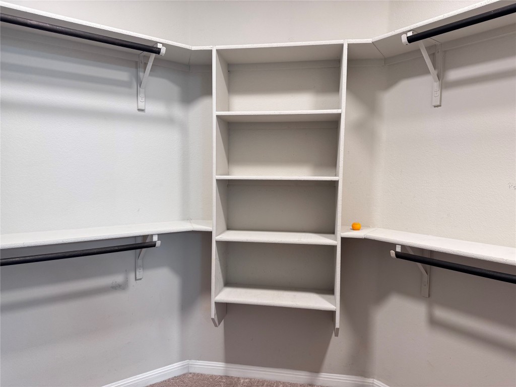 16420 Pienza Drive Pflugerville, TX 78660 - Photo 17 of 26 Spacious closet with carpet flooring
