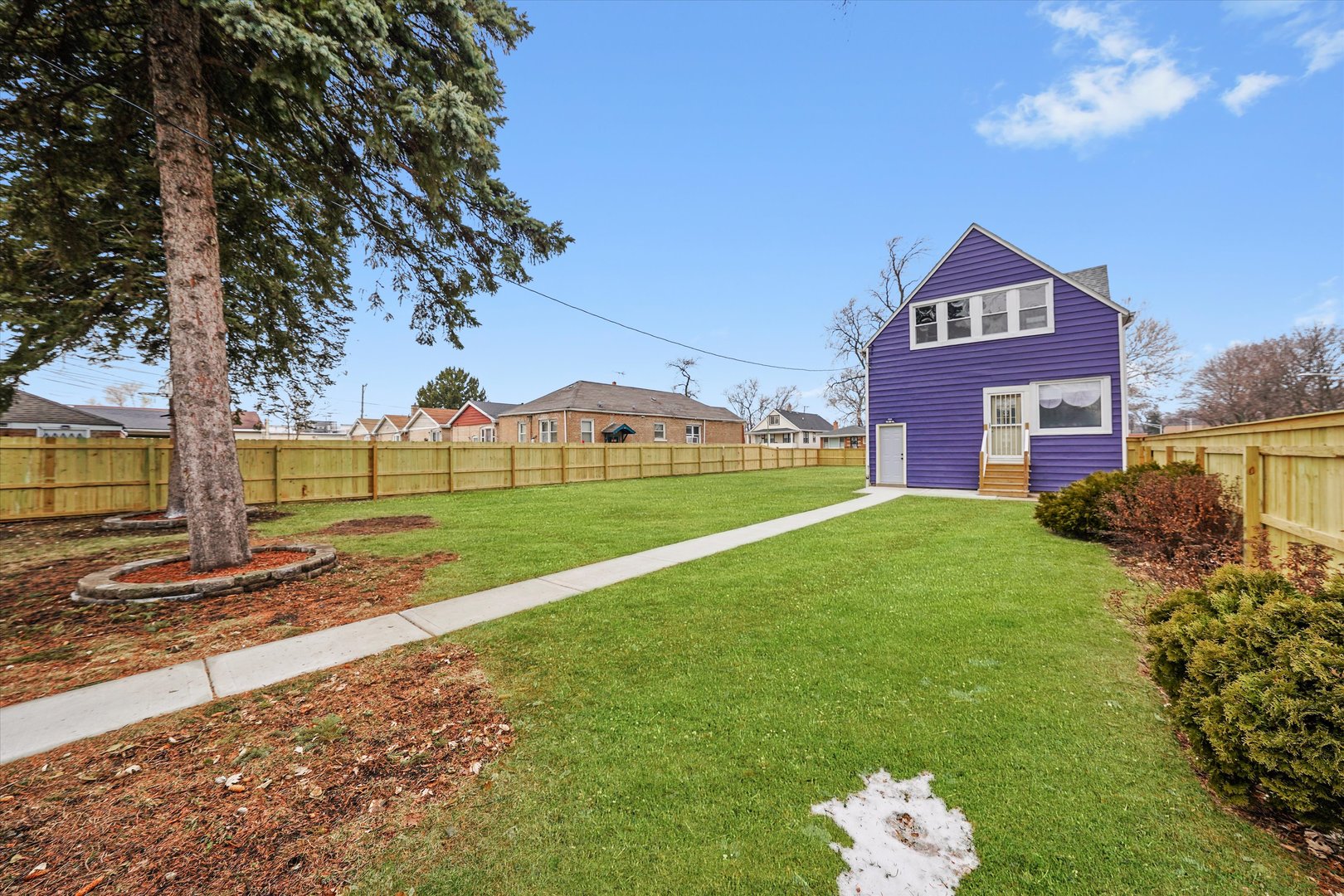 721 West 116th Street Chicago, IL 60628 - Photo 6 of 11 a view of a road with a building in the background
