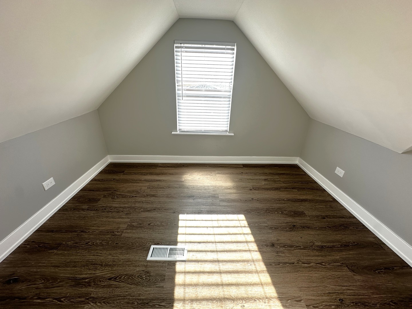 7304 West 57th Street Summit, IL 60501 - Photo 10 of 12 a view of empty room with wooden floor and fan