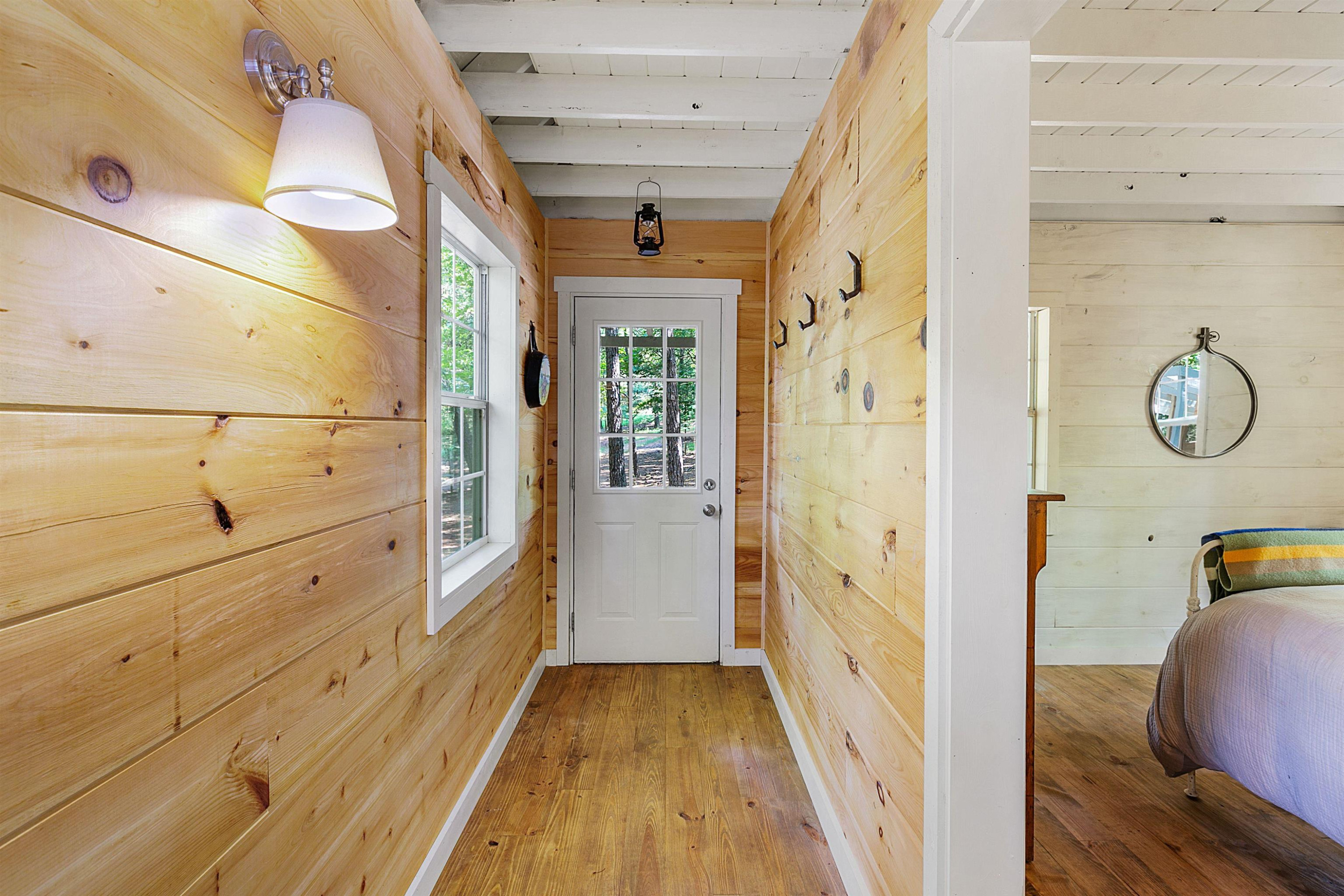 1325 Center Hill Road Finger, TN 38334 - Photo 4 of 24 a view of a hallway with wooden floor