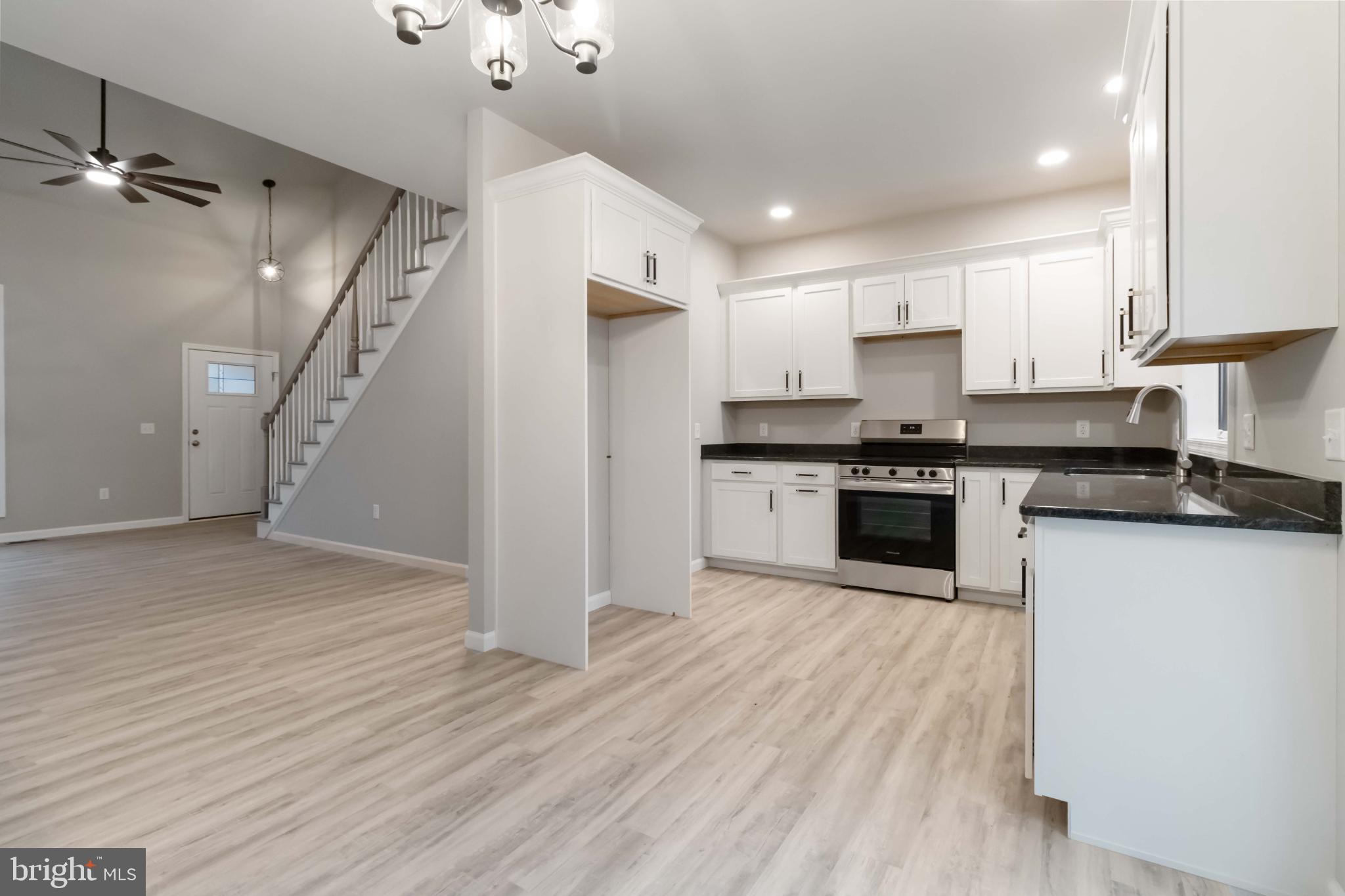 1735 Quarry Road Lebanon, PA 17046 - Photo 11 of 35 Modern open-concept kitchen and living space.