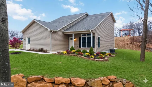 a backyard of a house with garden