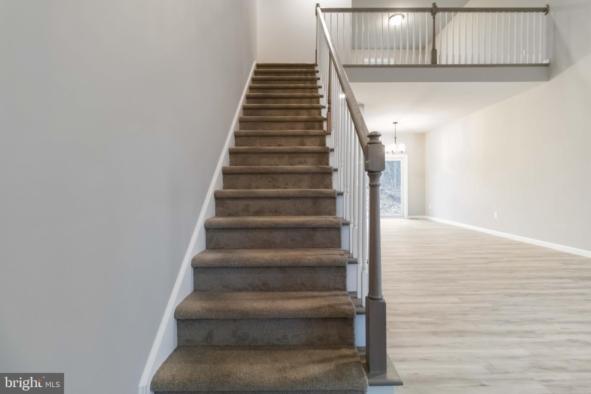 1735 Quarry Road Lebanon, PA 17046 - Photo 23 of 35 Inviting staircase leads to open living space.