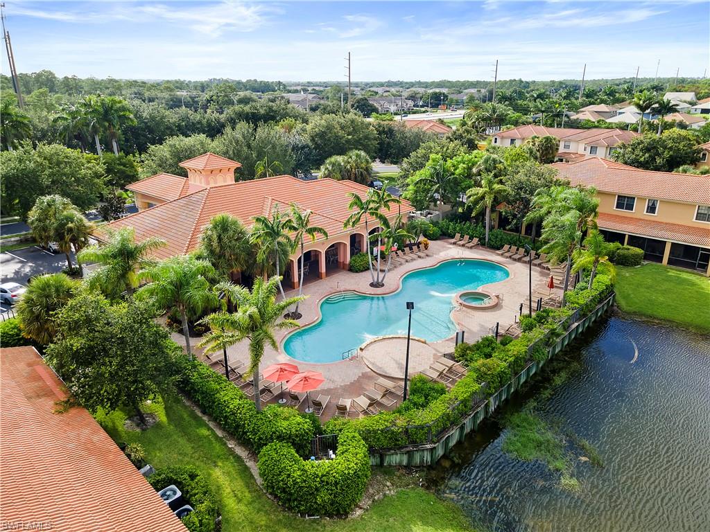 7542 Bristol Circle Naples, FL 34120 - Photo 23 of 26 View of pool with a patio area