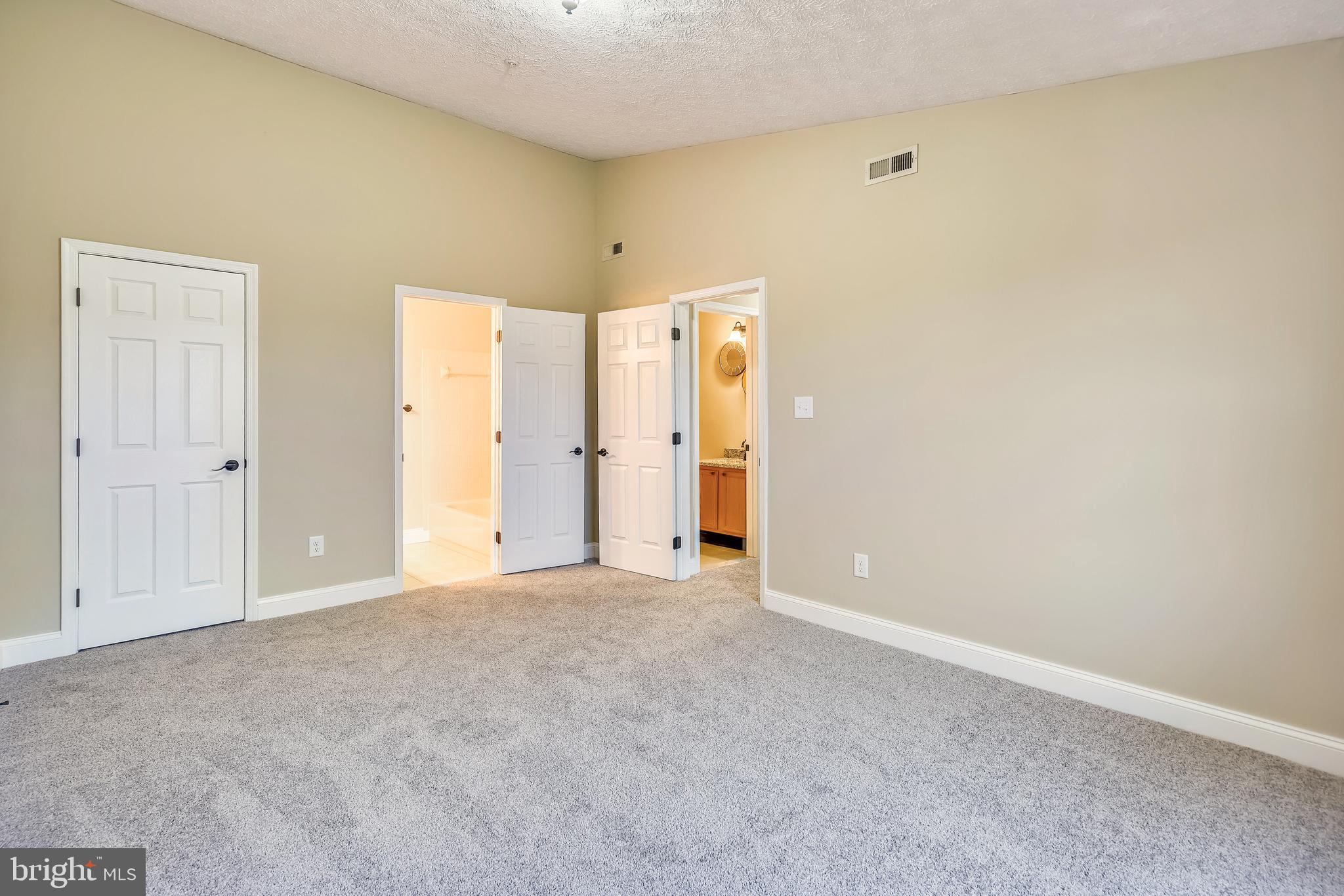 2408 Forest Edge Court, Unit 303 Odenton, MD 21113 - Photo 15 of 46 a view of an empty room