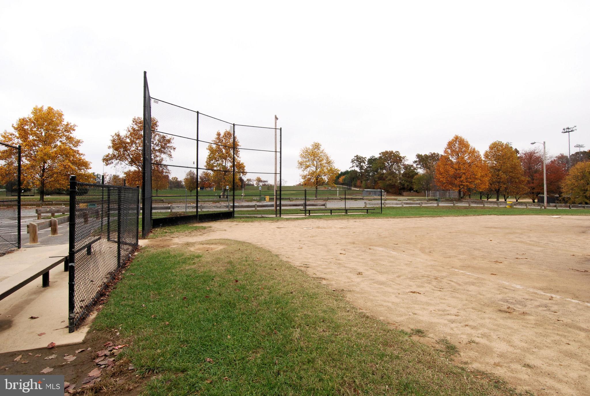 2408 Forest Edge Court, Unit 303 Odenton, MD 21113 - Photo 22 of 46 a view of outdoor space with deck and yard