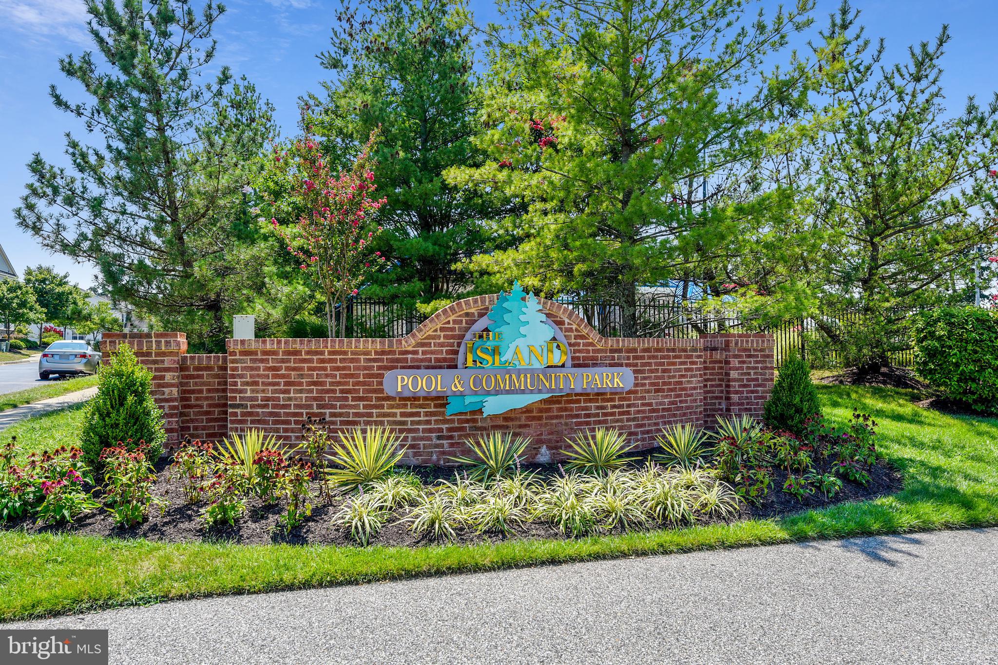 2408 Forest Edge Court, Unit 303 Odenton, MD 21113 - Photo 23 of 46 a backyard of a house with lots of green space