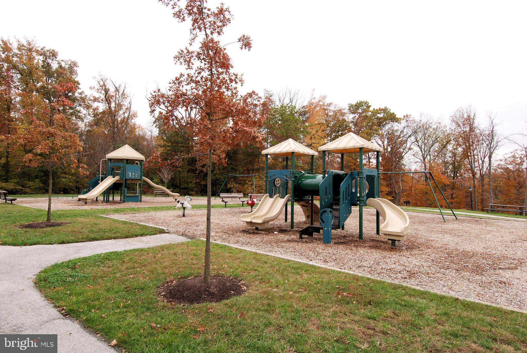 2408 Forest Edge Court, Unit 303 Odenton, MD 21113 - Photo 28 of 46 a view of a park with slide