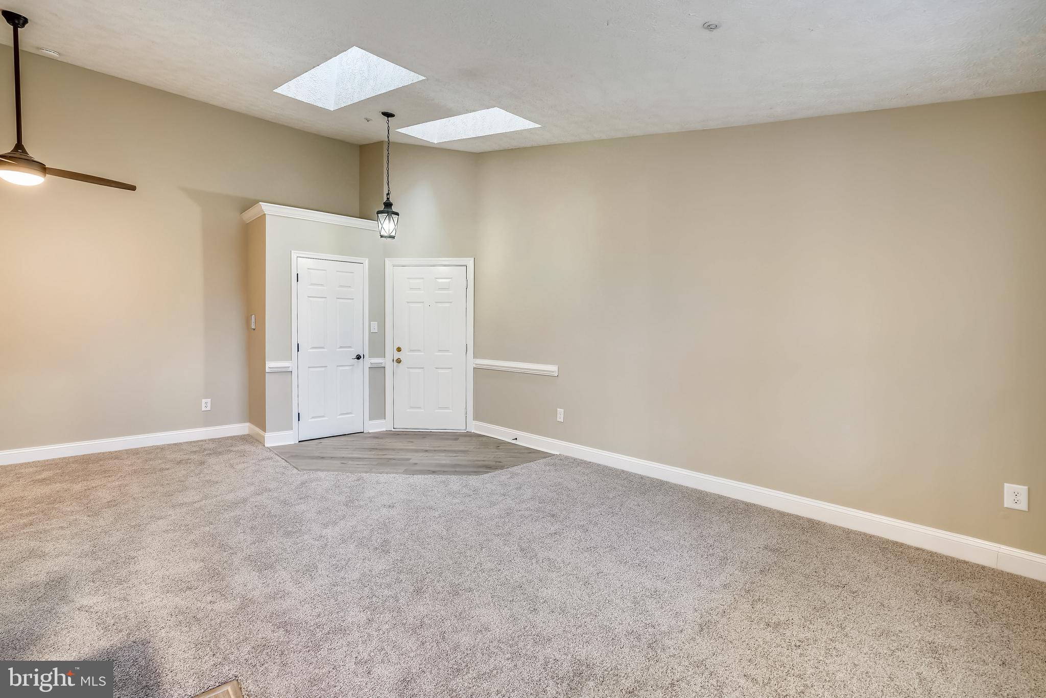 2408 Forest Edge Court, Unit 303 Odenton, MD 21113 - Photo 5 of 46 a view of an empty room