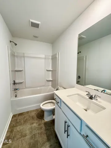 a view of swimming pool with a yard