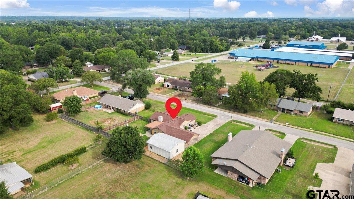 906 Zola Street Quitman, TX 75783 - Photo 11 of 41 an aerial view of residential houses with outdoor space and swimming pool
