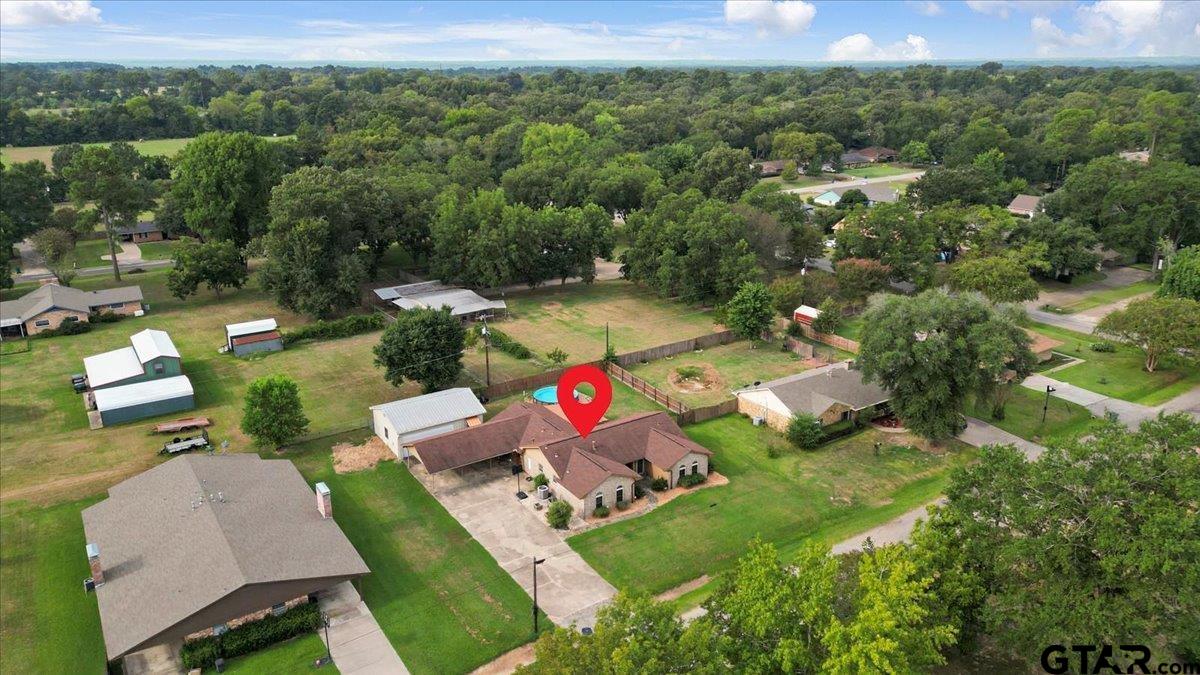906 Zola Street Quitman, TX 75783 - Photo 12 of 41 an aerial view of a house with a yard