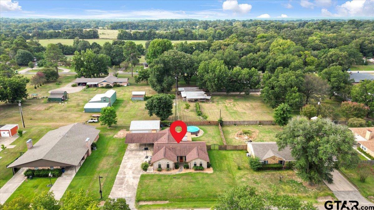 906 Zola Street Quitman, TX 75783 - Photo 13 of 41 an aerial view of residential houses with outdoor space