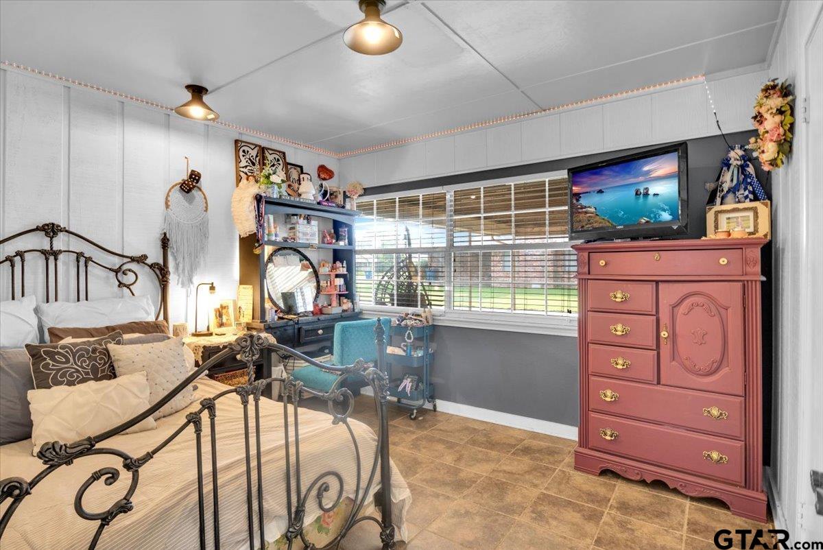 906 Zola Street Quitman, TX 75783 - Photo 34 of 41 a view of a livingroom with furniture and a window
