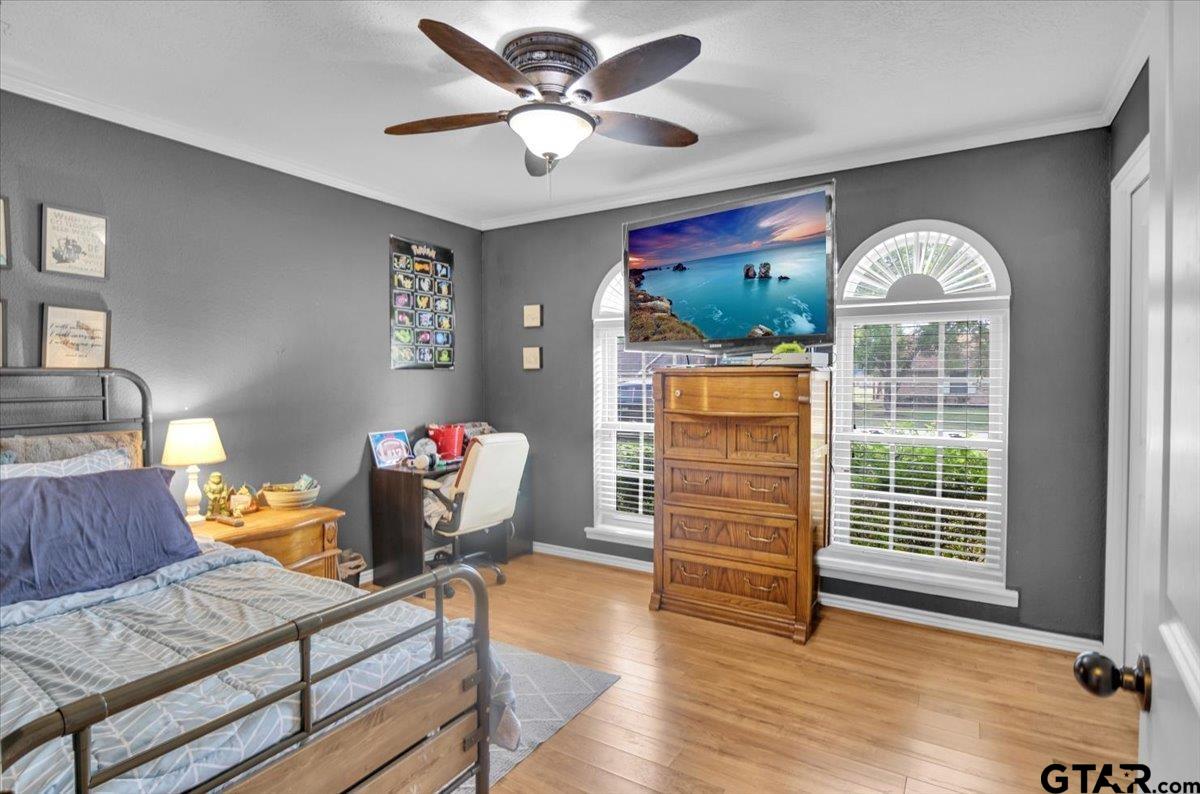 906 Zola Street Quitman, TX 75783 - Photo 36 of 41 a view of a livingroom with furniture window entryway and wooden floor