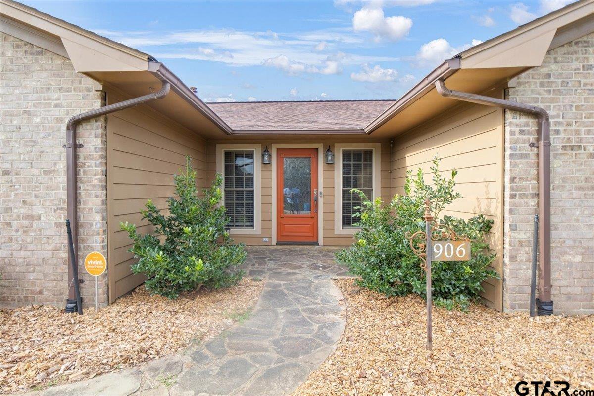 906 Zola Street Quitman, TX 75783 - Photo 4 of 41 a view of entrance of house and yard