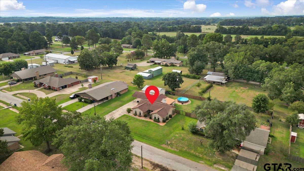 906 Zola Street Quitman, TX 75783 - Photo 10 of 41 an aerial view of residential houses with outdoor space