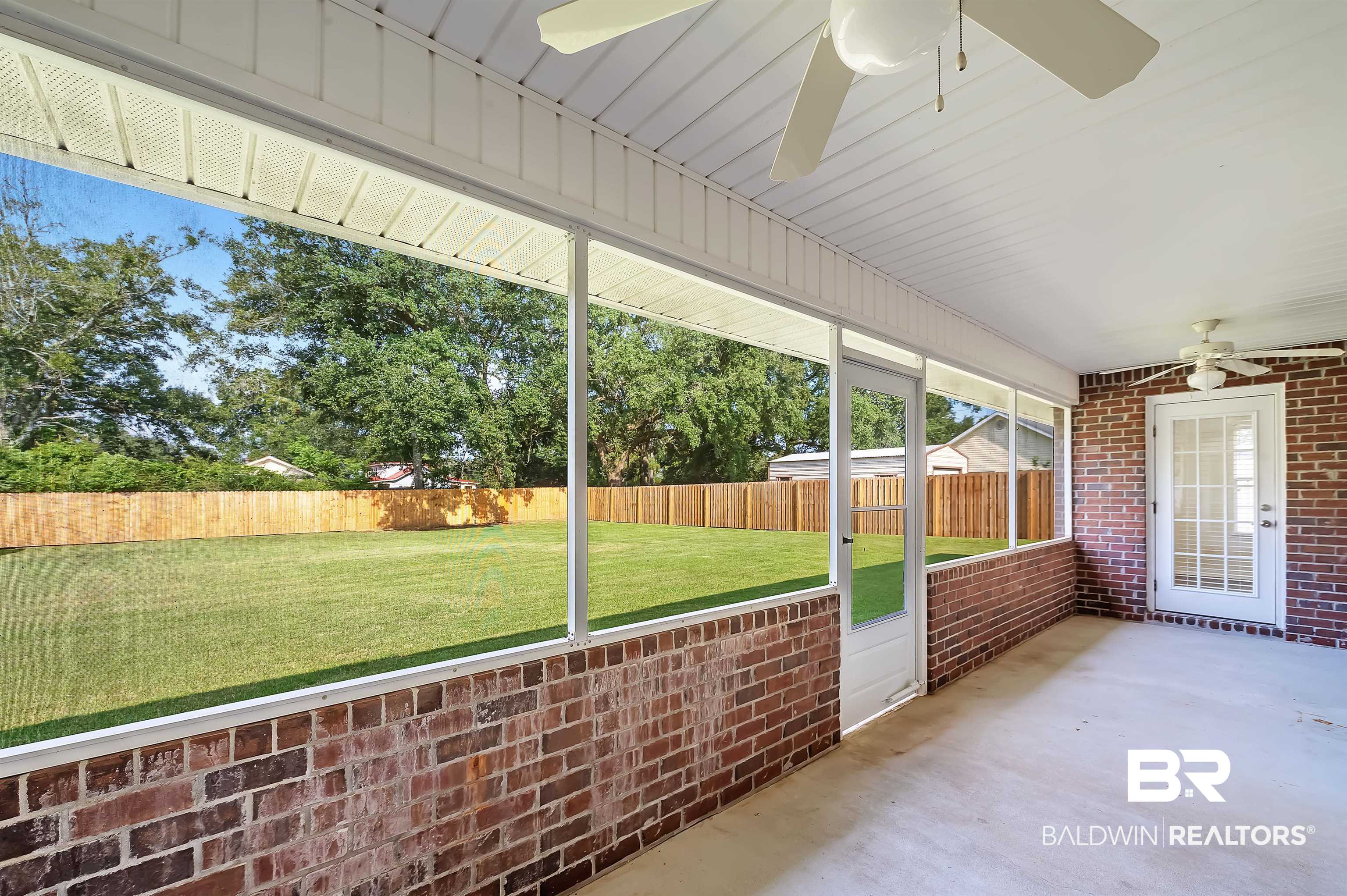 12443 Venice Boulevard Foley, AL 36535 - Photo 10 of 59 Unfurnished sunroom with ceiling fan