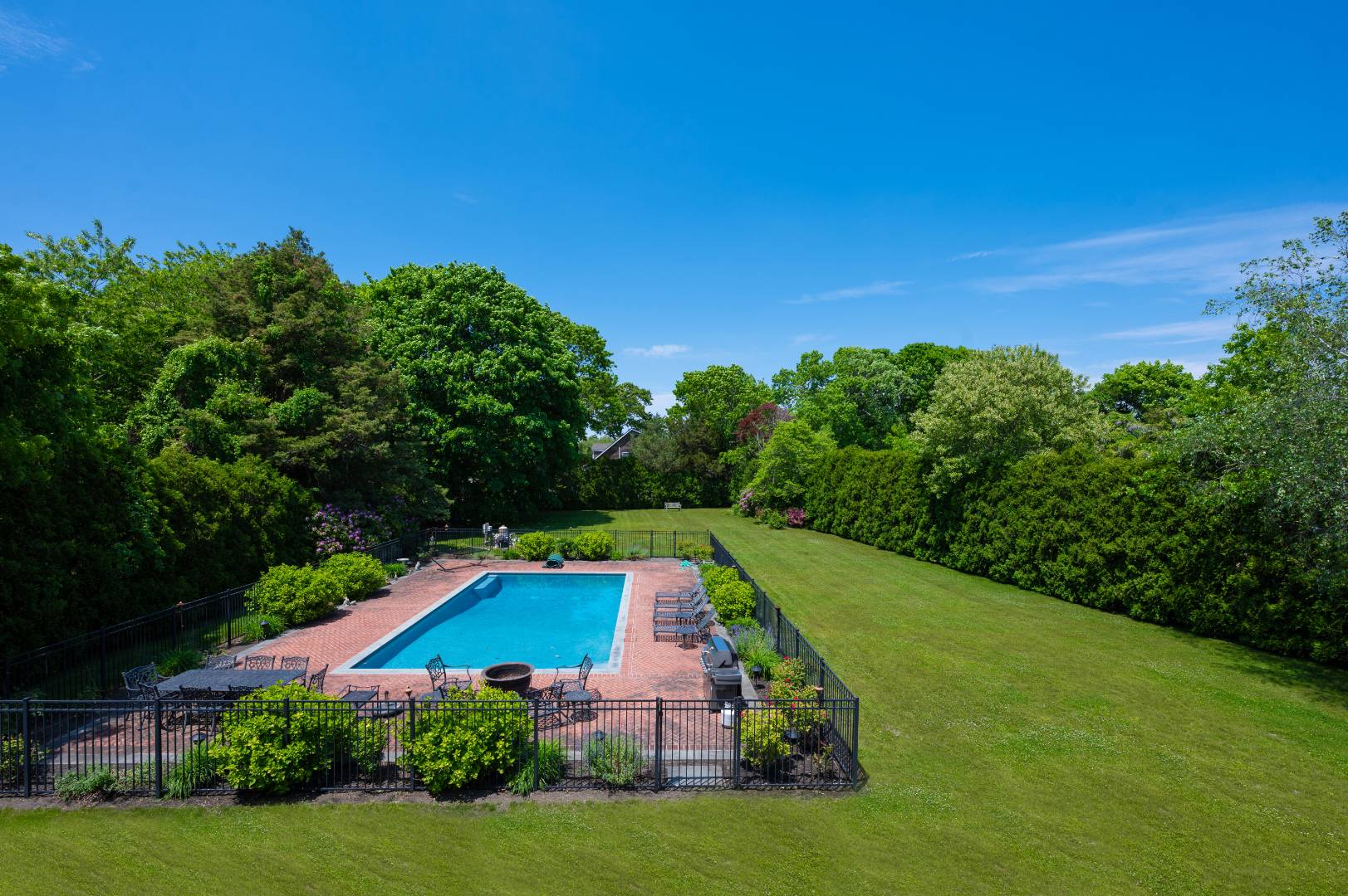 15 Dock Road Remsenburg, NY 11960 - Photo 2 of 34 a view of swimming pool with a yard
