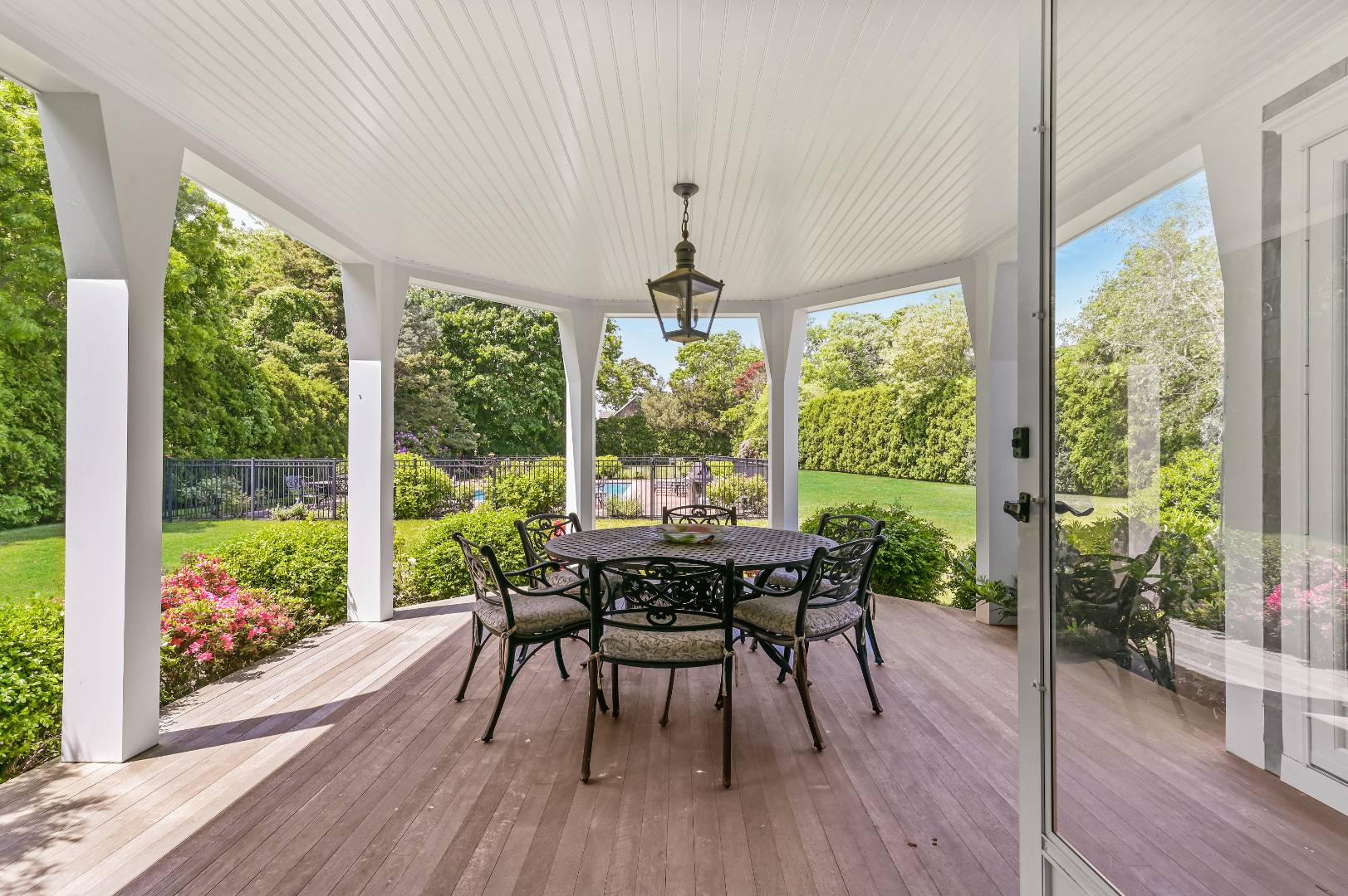 15 Dock Road Remsenburg, NY 11960 - Photo 18 of 34 a view of a dining room with furniture window and wooden floor