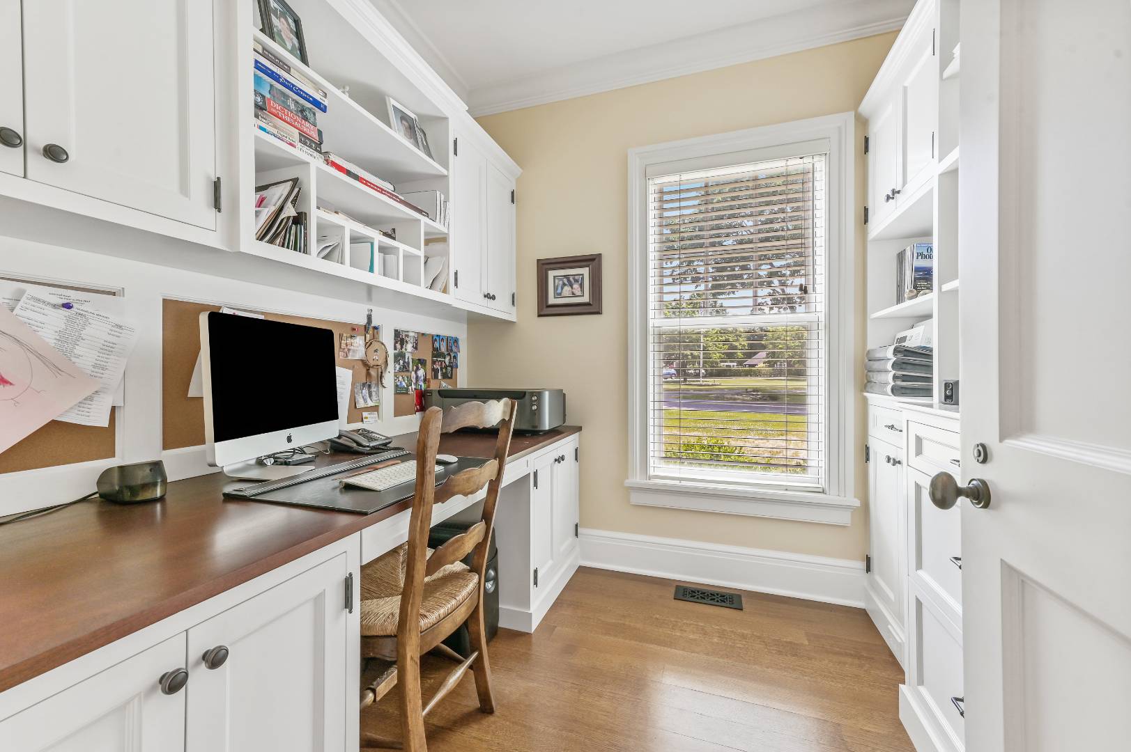 15 Dock Road Remsenburg, NY 11960 - Photo 20 of 34 a view of a workspace with furniture and a window