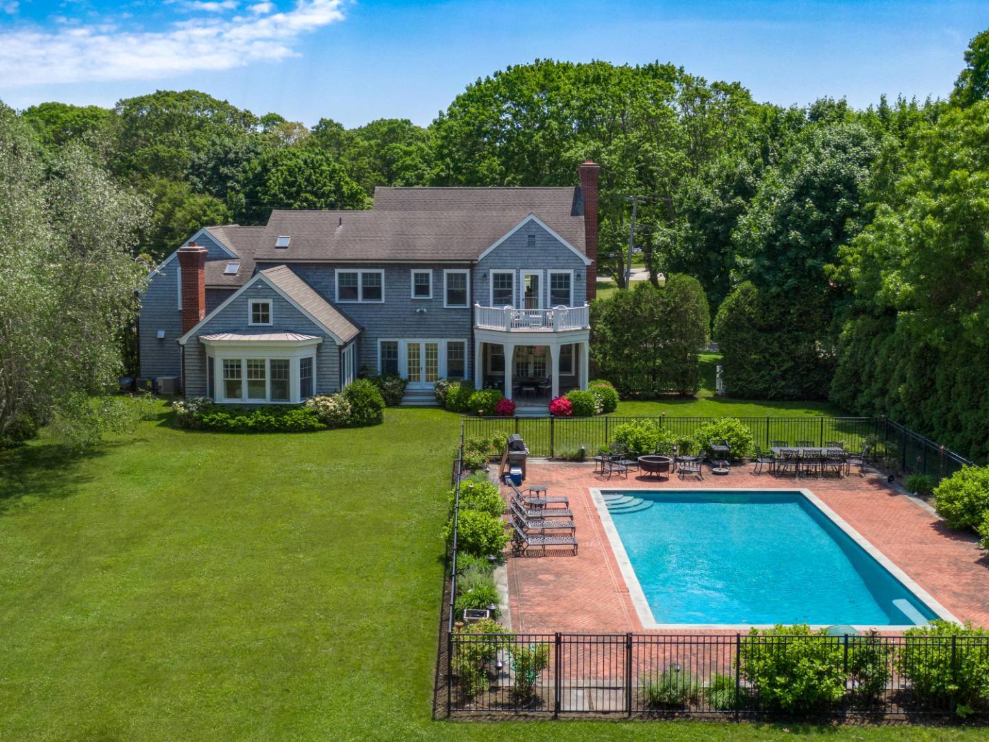 15 Dock Road Remsenburg, NY 11960 - Photo 31 of 34 a aerial view of a house with a yard