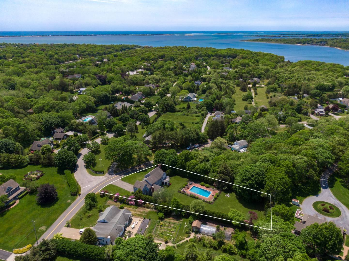 15 Dock Road Remsenburg, NY 11960 - Photo 34 of 34 an aerial view of residential houses with outdoor space and trees