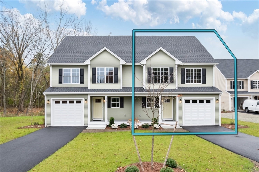 515 Mendon Road, Unit 515 Attleboro, MA 02703 - Photo 2 of 33 a view of a large center with a table and chairs