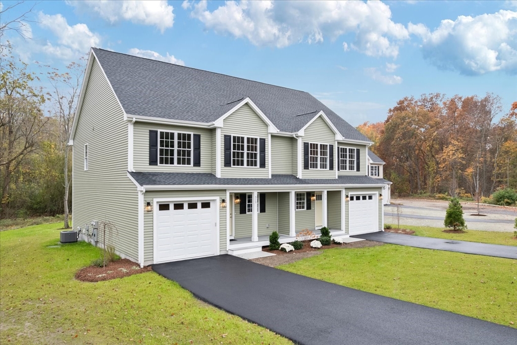 515 Mendon Road, Unit 515 Attleboro, MA 02703 - Photo 5 of 33 a view of a house with a swimming pool