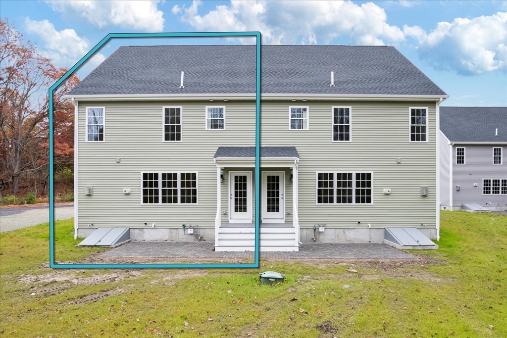 515 Mendon Road, Unit 515 Attleboro, MA 02703 - Photo 7 of 33 a front view of a house with a yard