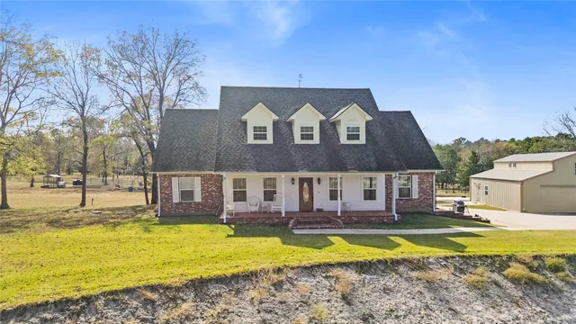 a view of a house with swimming pool