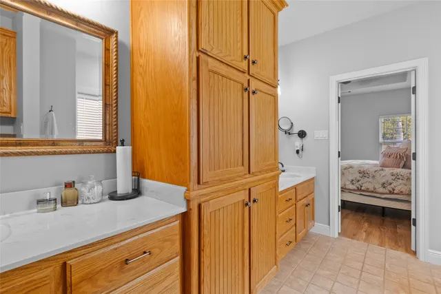 a bedroom with a bed and a view of bedroom