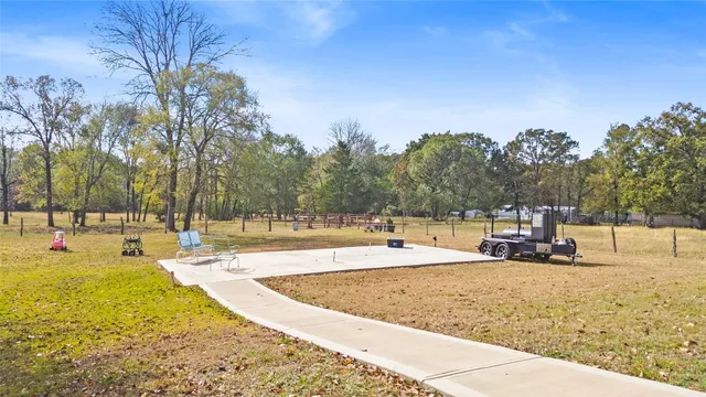 a view of a white building with a outdoor space