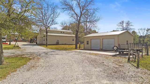 a house with trees in front of it