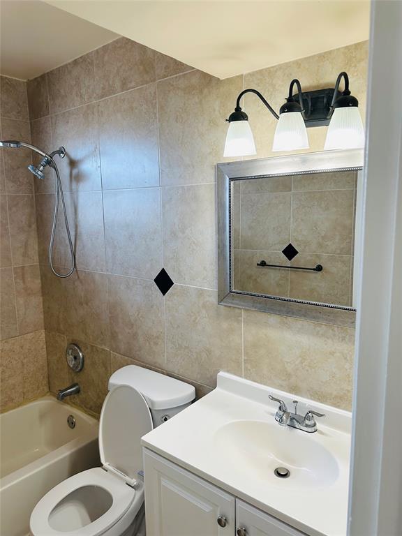 10046 Winding Lake Road, Unit 203 Sunrise, FL 33351 - Photo 24 of 31 a bathroom with a sink toilet and shower