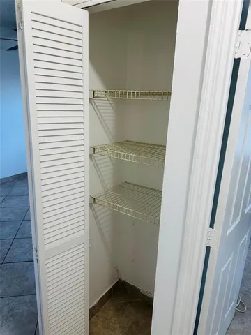 a kitchen with stainless steel appliances cabinets and counter space