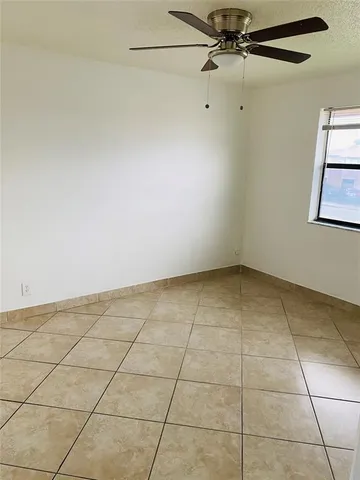 a view of a room and window