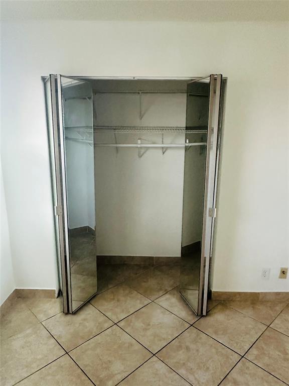 10046 Winding Lake Road, Unit 203 Sunrise, FL 33351 - Photo 10 of 31 a view of an empty room