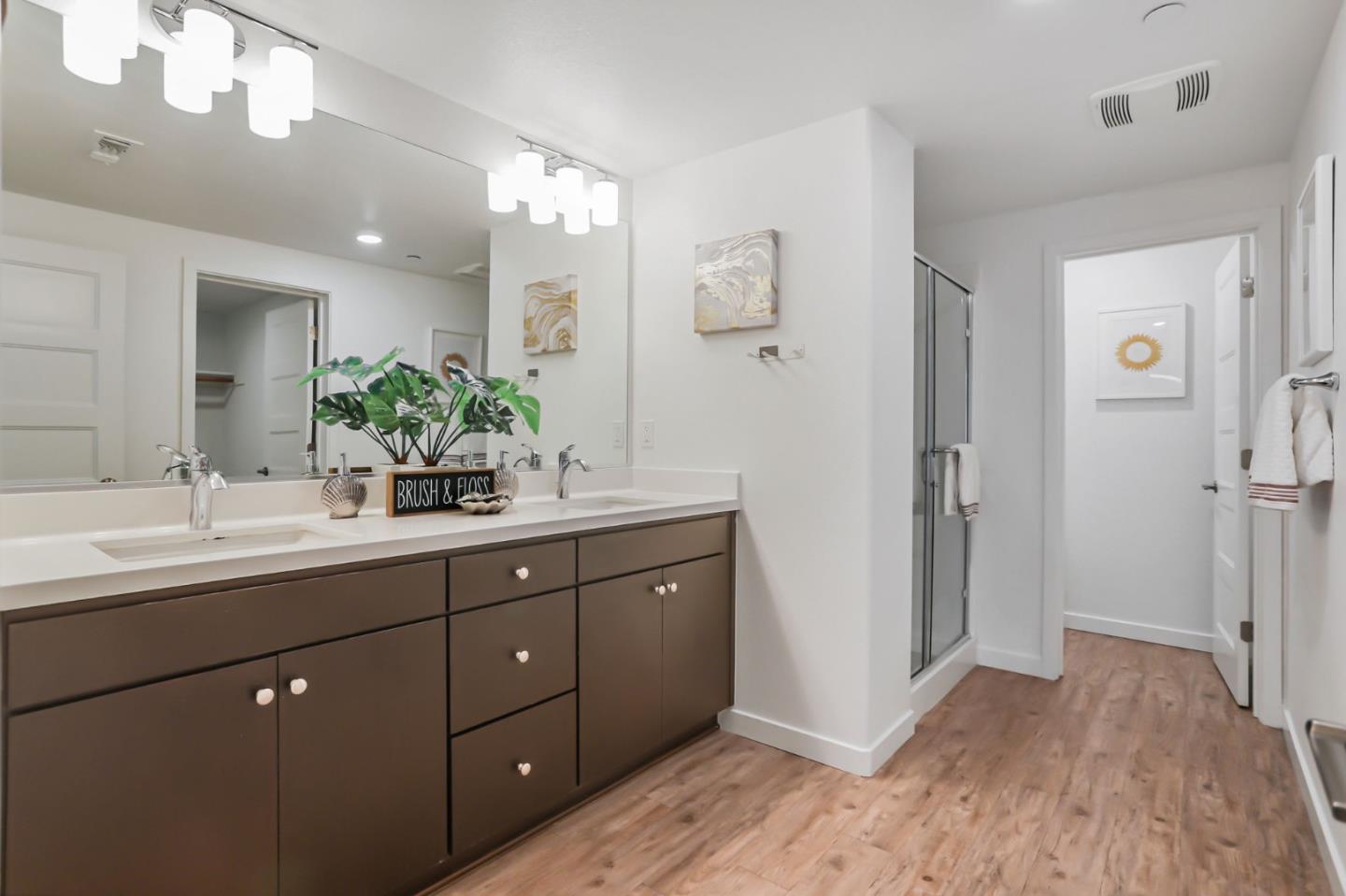 1883 Dobbin Drive San Jose, CA 95133 - Photo 20 of 27 a bathroom with a double vanity sink and mirror