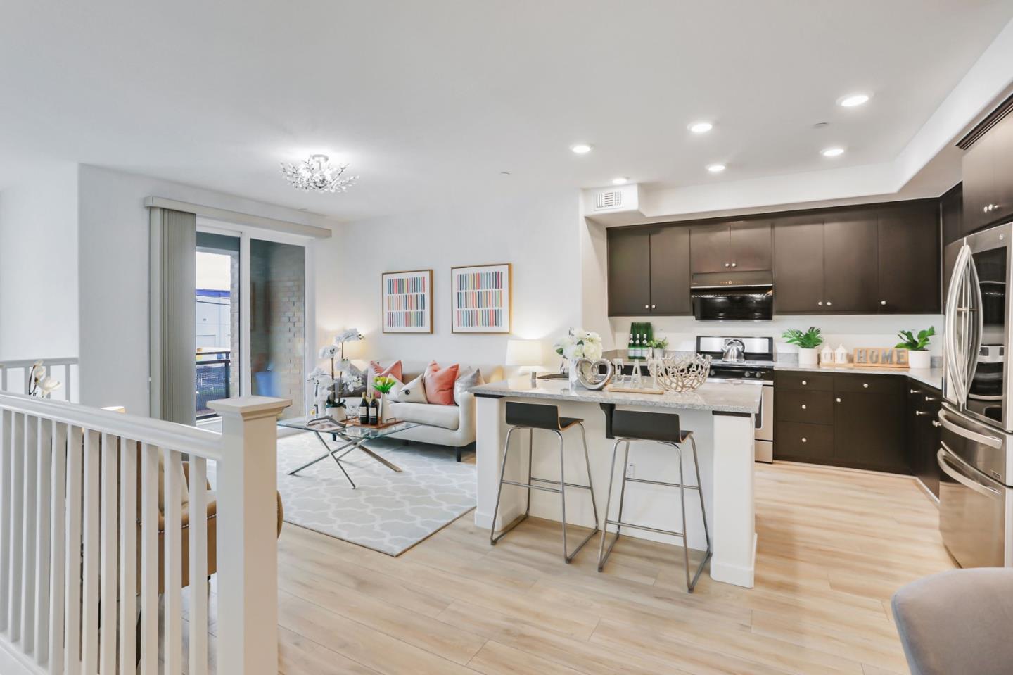 1883 Dobbin Drive San Jose, CA 95133 - Photo 5 of 27 a living room with stainless steel appliances kitchen island granite countertop furniture a kitchen view and a sink